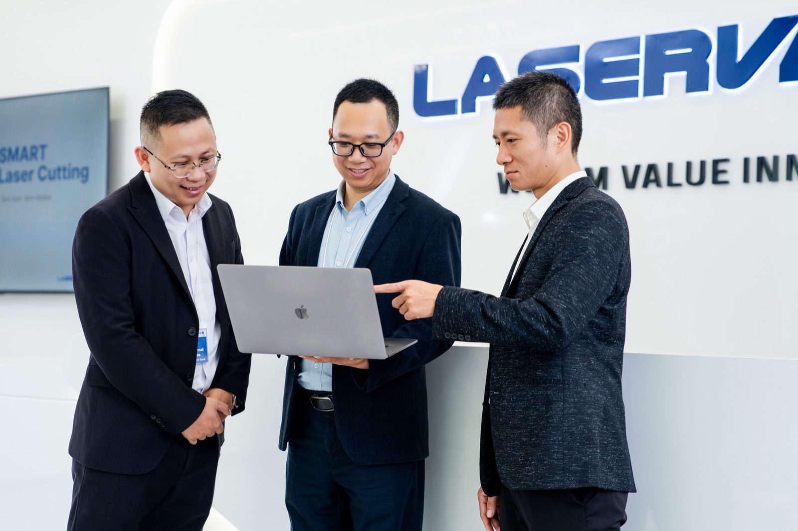 Laservall engineers in a team review